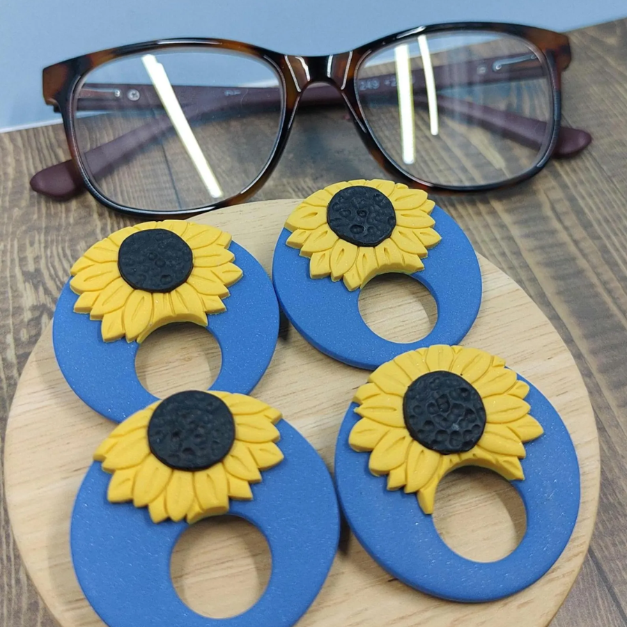 Glasses Holding Brooches